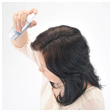 Spray Super Million Hair again to lock in hair fibers.