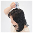Not to touch the bottle to the head, sprinkle Super Million Hair away from the hair again.